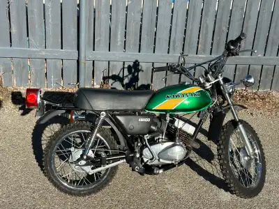1976 KM 100 2 stroke Kawasaki All original paint and seat, only 1257.8 miles on the Speedo. A great...