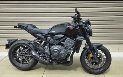 * ~ 2600 km only * First owner * Never dropped- Never abused * Extras : CB1000R tank pads and radiat...