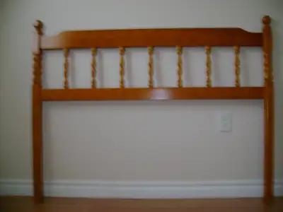 Double (54”) solid wood headboard. In good condition.