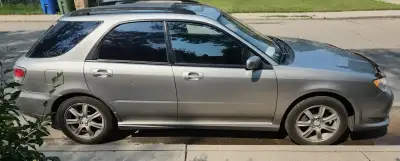 Most of these photos were taken a week ago when she was running great. Good: 5-speed manual 2.5L Sub...