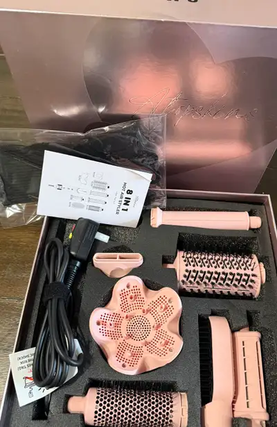 Get ready to revolutionize your hair styling routine with the Atopskins 8-in-1 Blow Dryer Brush & Ai...