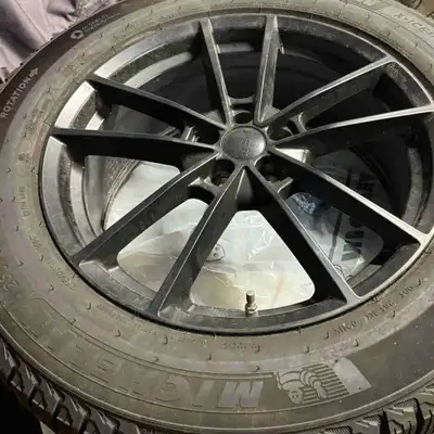 Used one season like new 255/55/R 19 REV gloss black alloys 5x108 bolt pattern