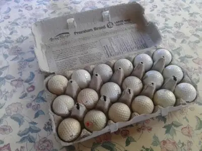 Couple dozen golf balls, View more