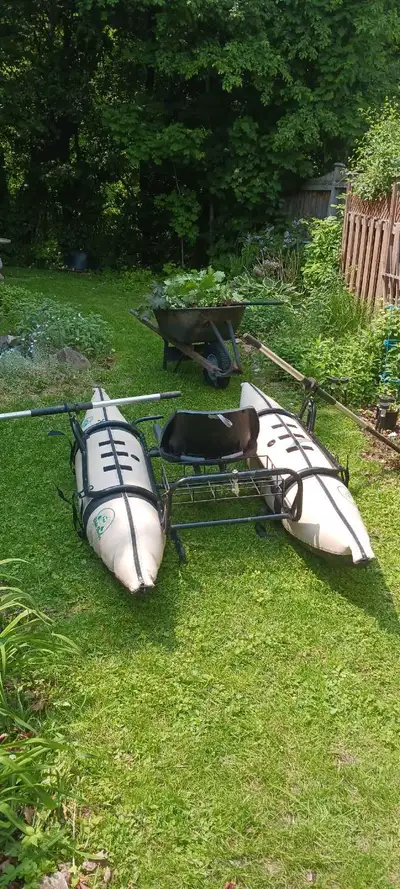 Pontoon boat used once, used it summers ago with trolling motor. Comes with paddles and pump.