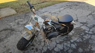 Coleman CT200U-EX minibike. 196cc. Well used condition. Works good. Good tires, worn front tire. $75...