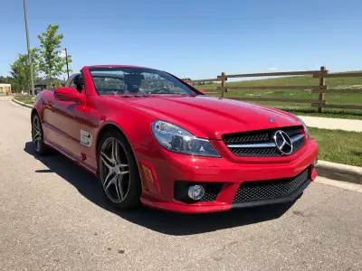 Mercedes SL 63 AMG for sale. 2009 with only 16,500 kilometers. Has never seen rain let alone any col...