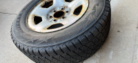 Bridgestone Tire on 6 bolt rim- only $50 obo size 245-65-17