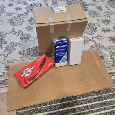 Sold the car and never got to install these parts. Asking $100 for everything. GM Genuine water pump...