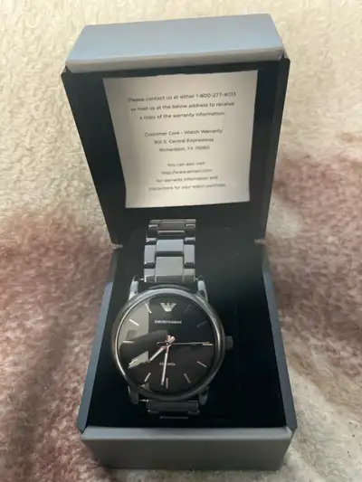 Black ceramic Emporio Armani genuine new watch in original box with extra parts for bracing. Replace...