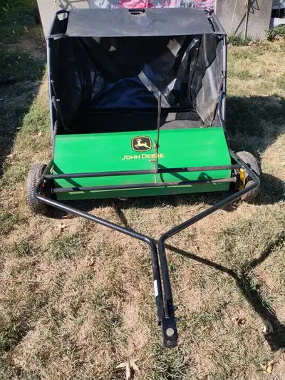John Deere lawn Sweeper . Sells for 998 home Depot.