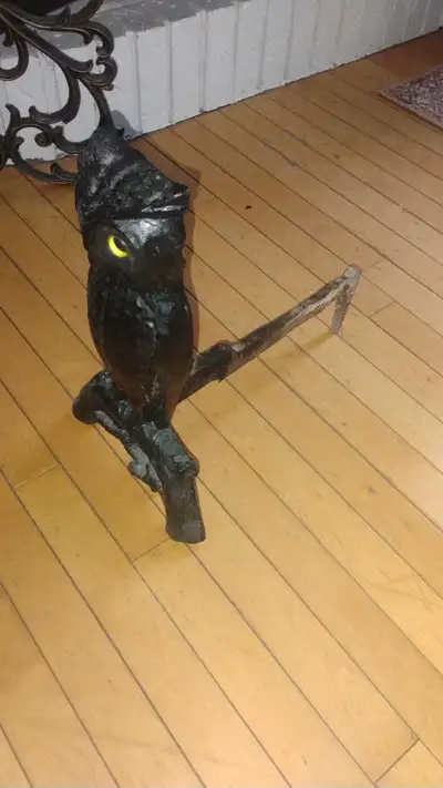 Enhance your fireplace with these vintage-inspired cast iron owl andirons, perfect for adding a touc...