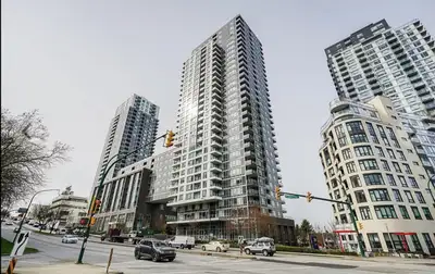 Private room shared bathroom in a 3 bedroom condo 5 mins walk to Joyce skytrain station Steps from b...