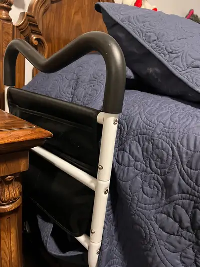 Short bed rail- helps for getting into and out of bed and positioning