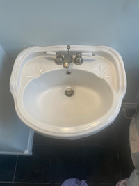 Pedestal sink with faucet 