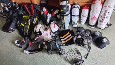 hockey shoulder pads and other equipment., View more