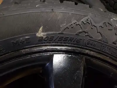 Toyota 205/16/55 tires and aluminum rim. Rims are good, but need new tires. Was gonna use as a set o...