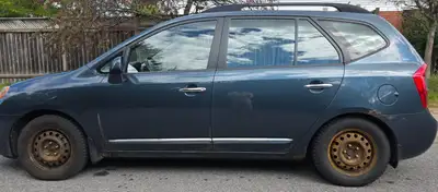 Selling my 2009 Kia Rondo EX as-is. It starts and drives well, with only about 132,000 km. Practical...