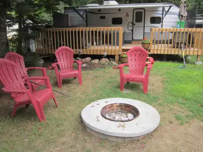 fully furnished. turn key trailer, big deck ,new flat top weber grill and bbq,dishes pots pans etc....