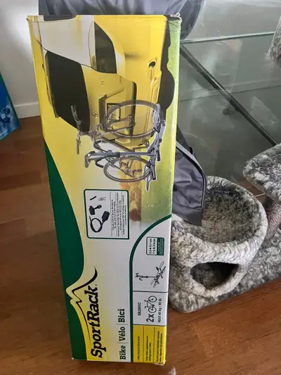 Includes locks to secure bike to the rack and the rack to the vehicle.