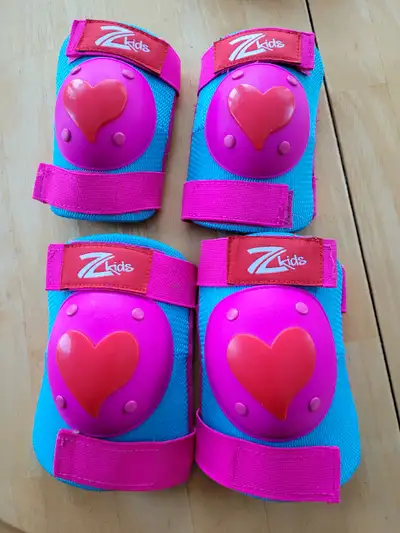 Kids elbow & knee pads New without tags Velcro closures Both sets for $4.00 *Check out my other ads*
