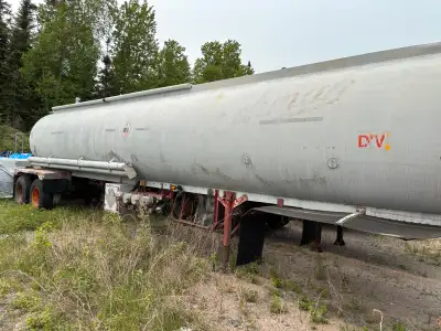 Older tanker trailer. Located in red Lake Ontario