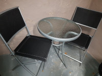 Patio table with two chairs, see pictures