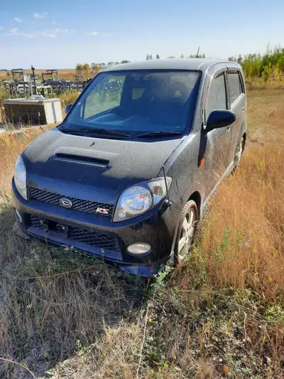 Daihatsu 2002 nice litte car in side and out. Tires are great run nice.