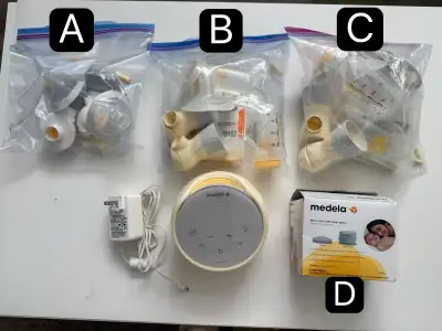 Medela Sonata Breast Pump + Lightly Used Parts (21mm & 24mm), View more