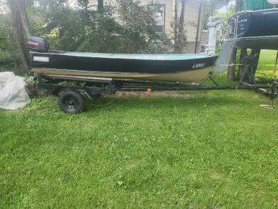 13ft. Aluminum boat forsale, comes with motor, gas tank, and trailer. Motor is 8hp evinrude, runs go...