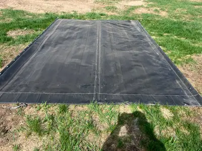 The tarp measures 13’3” long and 8’7” wide. Was bought new and never used as it was the wrong size....
