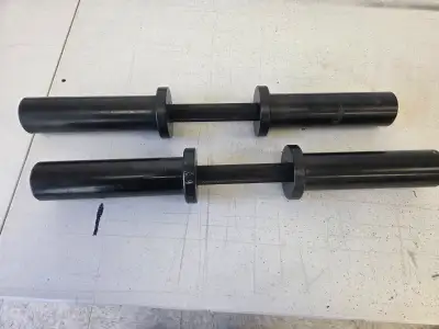 Dumb bells. For 2 inch olympic weights. Sold by the pair., View more