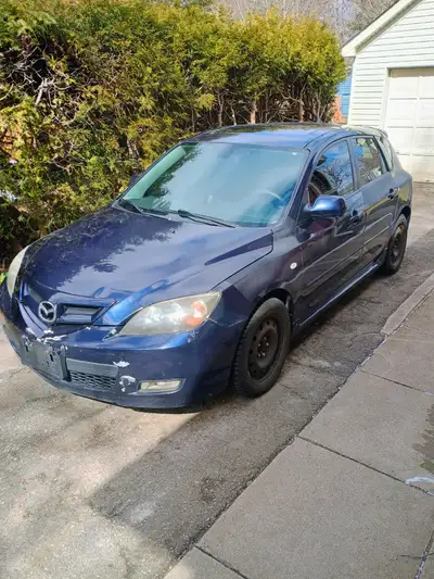 2009 Mazda 3 Hatchback. Low Kms. Surprisingly little rust. All electronics working. Heat, AC, window...