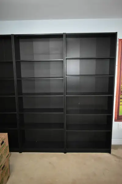 Tall black bookcases, View more