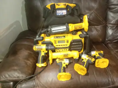 -1 light -3 impact drills -1 cordless drill driver -1 right angel drill/driver -1 18volt work radio...