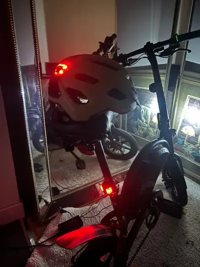 Electric bike with charger and helmet $100, View more