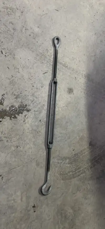 About 44 inches fully extended. About 24 minimum Galvanized. Very heavy duty.