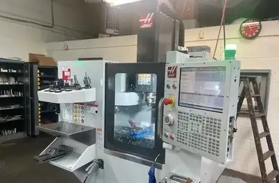 2021 HAAS MINI MILL TRAVELS: X-AXIS: 16" Y-AXIS: 12" Z-AXIS: 10" RAPID RATE X AXIS: 600 IPM RAPID RA...