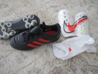 Adidas Youth Soccer Cleats and shin guards