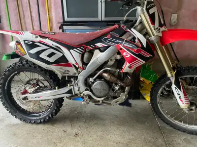 Selling CRF250. Runs great - only selling as no time to ride. Engine rebuilt after 105 hours. Curren...