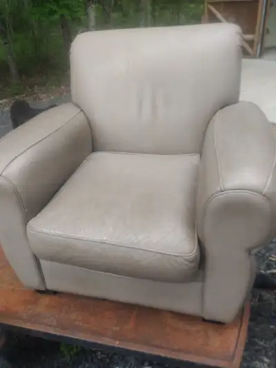 Comfy leather chair , no rips, no stains good condition.