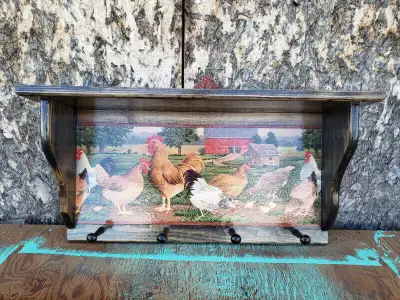 I have just finished building a pine coat shelf with a picture of chickens and chicks on it. The top...