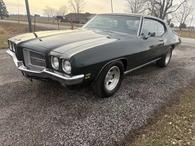 Car has a 455 with auto trans that runs nice, 4 barrel carb, column shift bench seat car, power disc...