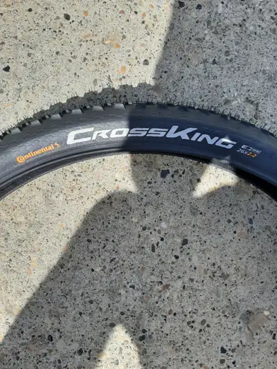 Brand New Continental Mountain Bike Tire Size is 26x2.2 Max. Inflation is 400pa Also includes Brand...