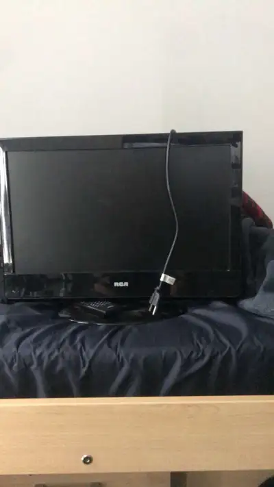 tv with a remote , View more