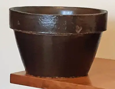 THIS PRIMITIVE GLAZED STONEWARE RIMMED BOWL CROCK IS 5 inches TALL AND 7-3/4 inches ACROSS THE TOP....