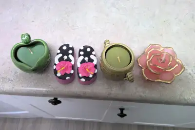 2 ceramic shaped candle holders w/candles, 3 candles no holders, View more