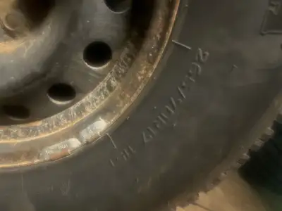 Offering a set of four truck winter tires on rims, size 265/70R17, perfect for safe winter driving....