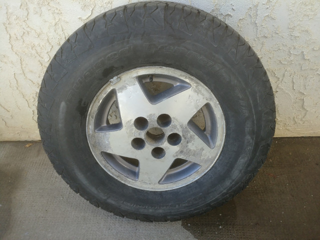 235/75R15 on Alloy 5x4.5" Rim BFGoodrich Tire in Tires & Rims in Lethbridge