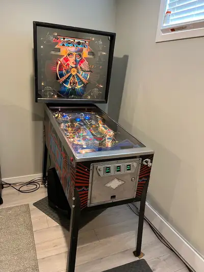 XENON pinball for sale comes with manual and original key tag.