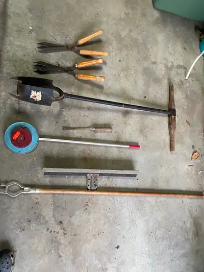 Post hole digger, grass shears, seed planter and window cleaner, View more